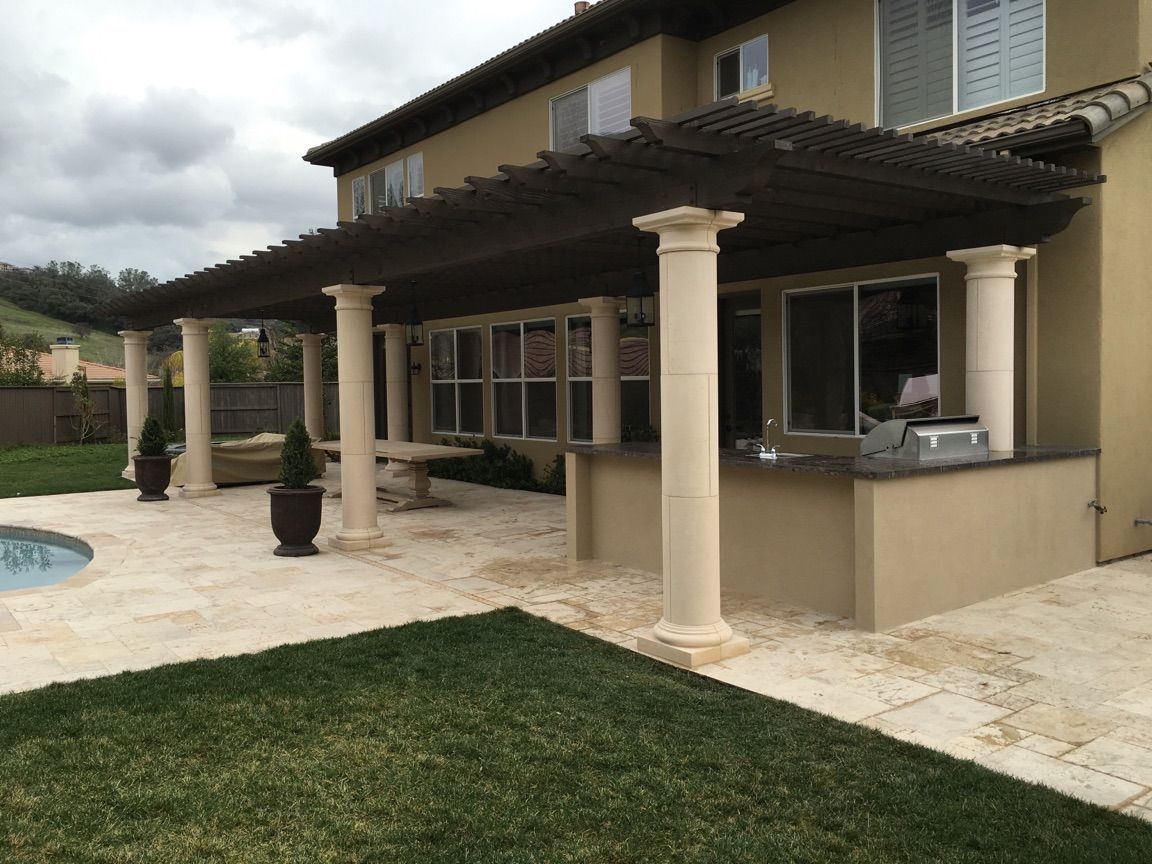 dark wood patio cover installation