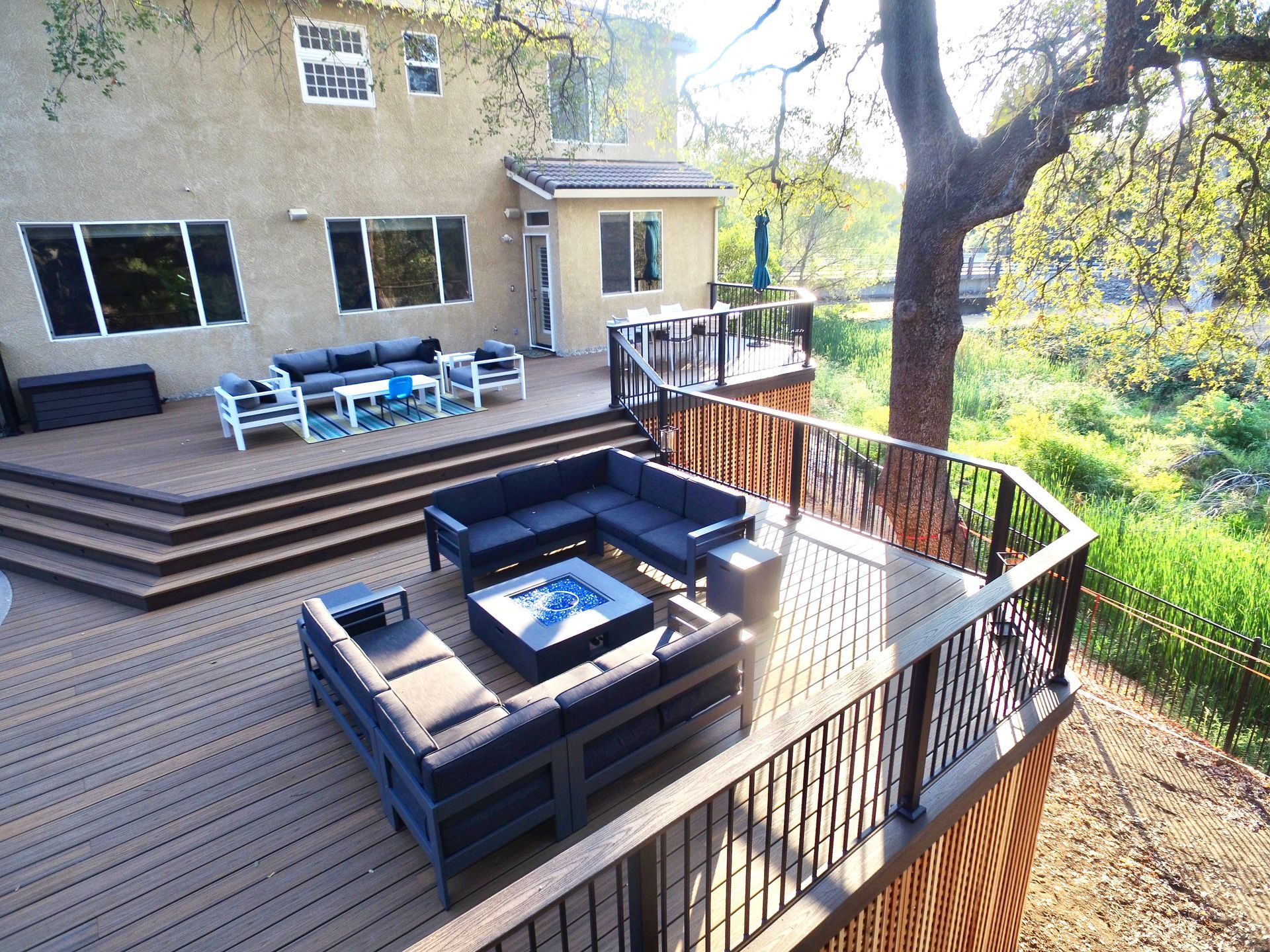 two level backyard deck installation with rails