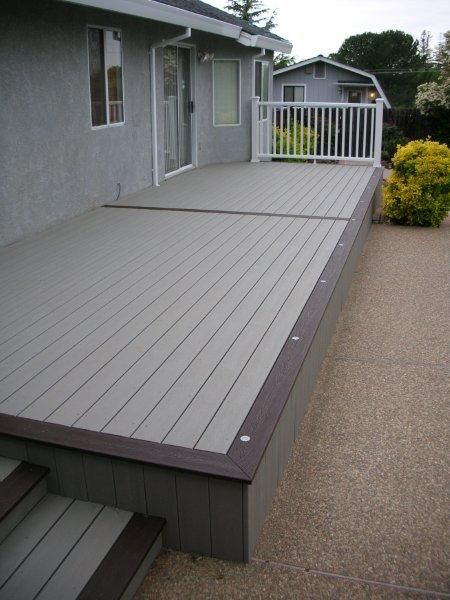 new deck railing installed at the highest elevation of the deck for protection