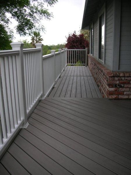 new white railing installed overlooking yard