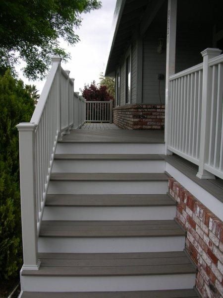 white stair railing with white post and cap