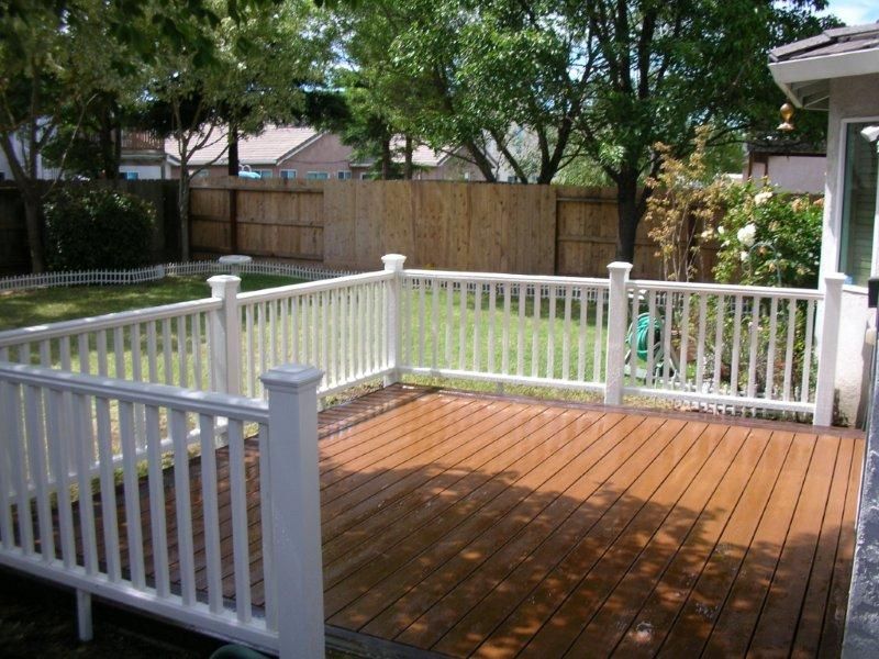 white in color deck railing and posts
