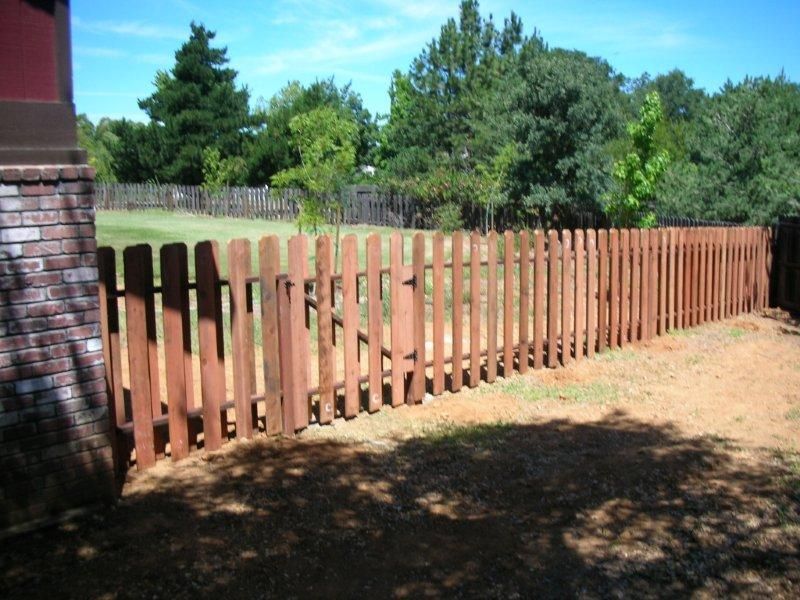 brown wood slatted fence