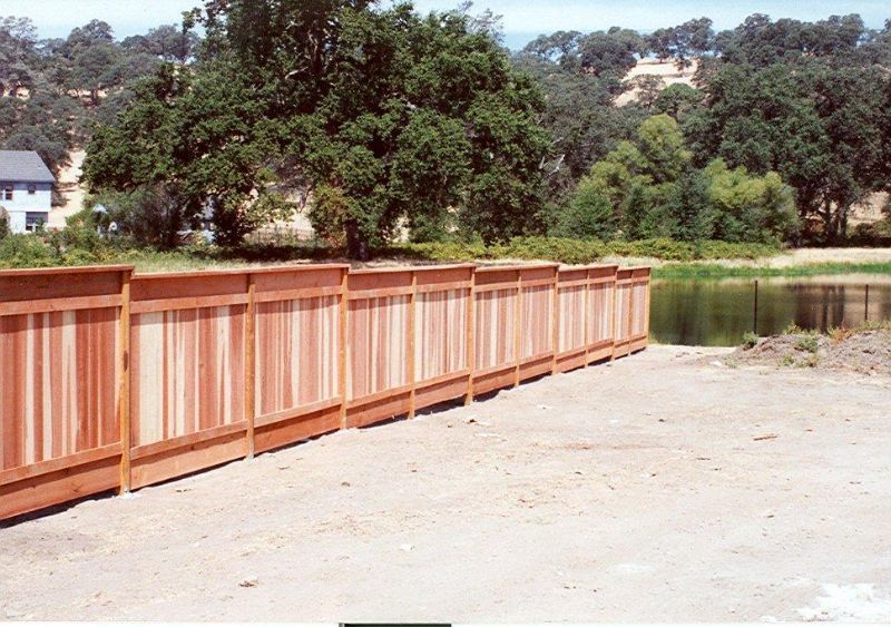 wood fencing built to the lake