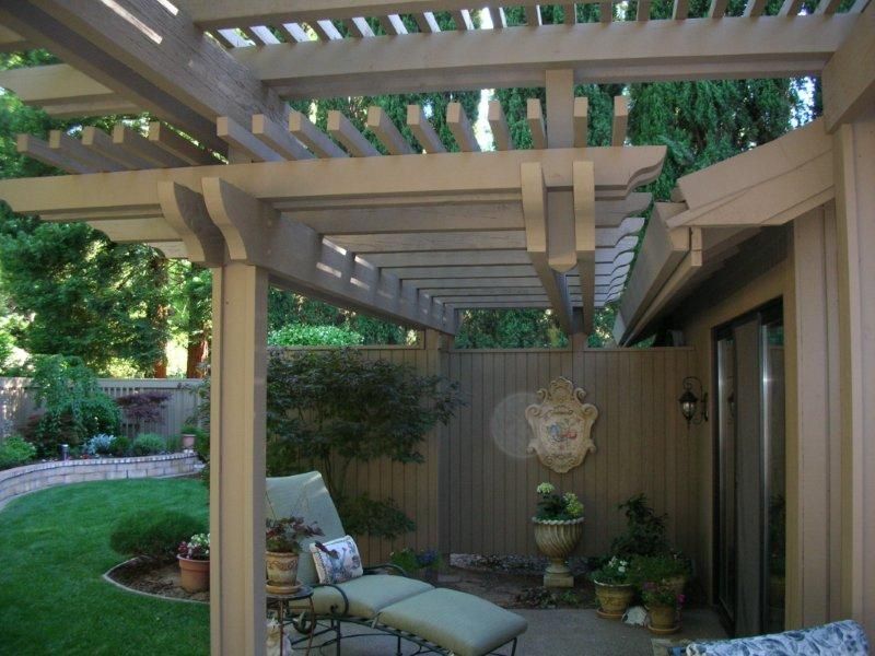 two tiered pergolas for backyard living space