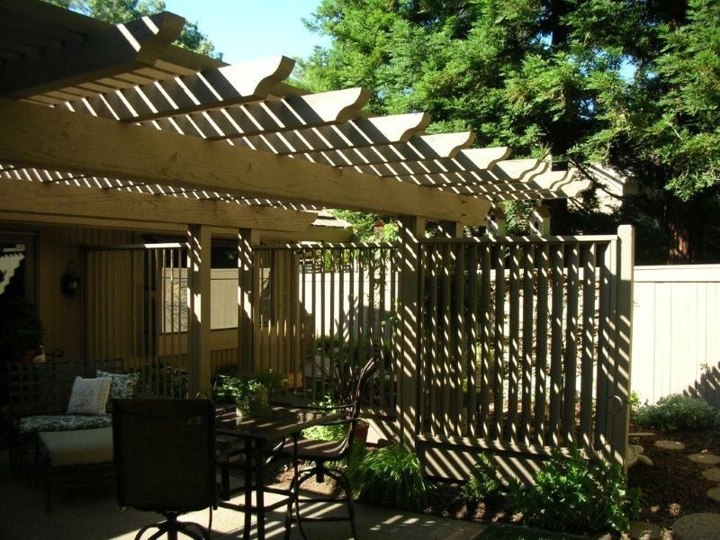 cream colored wood pergola for backyard living