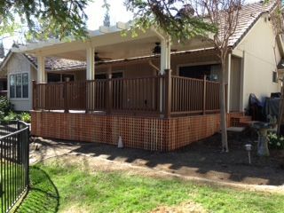 raised deck system with light wood railing