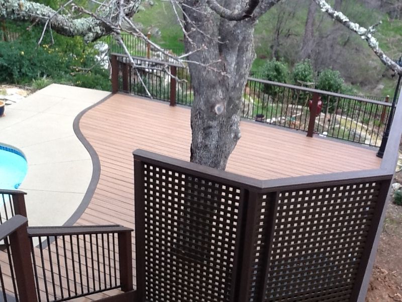 wood decking built around tree