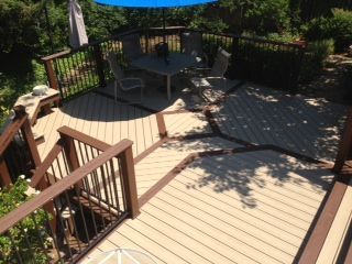 new decking with patio seating and new railings around deck