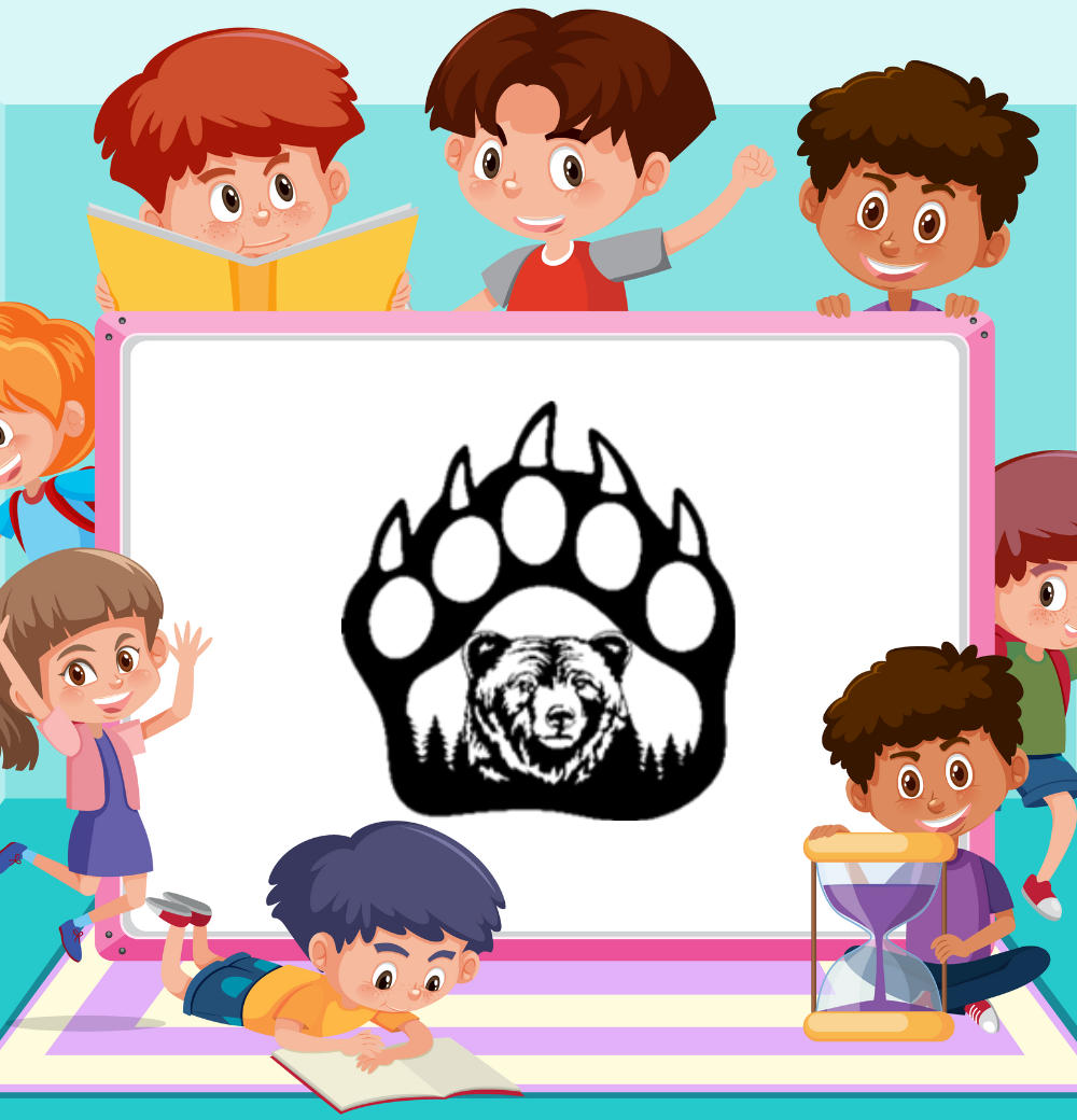 A group of children are sitting around a white board with a bear paw on it.