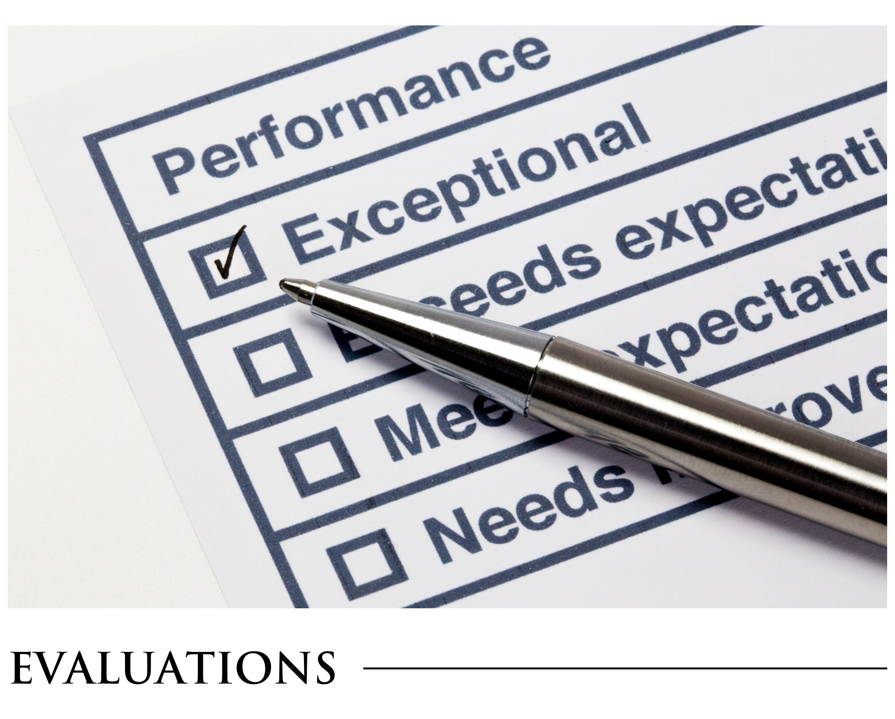 A pen is sitting on top of a performance checklist