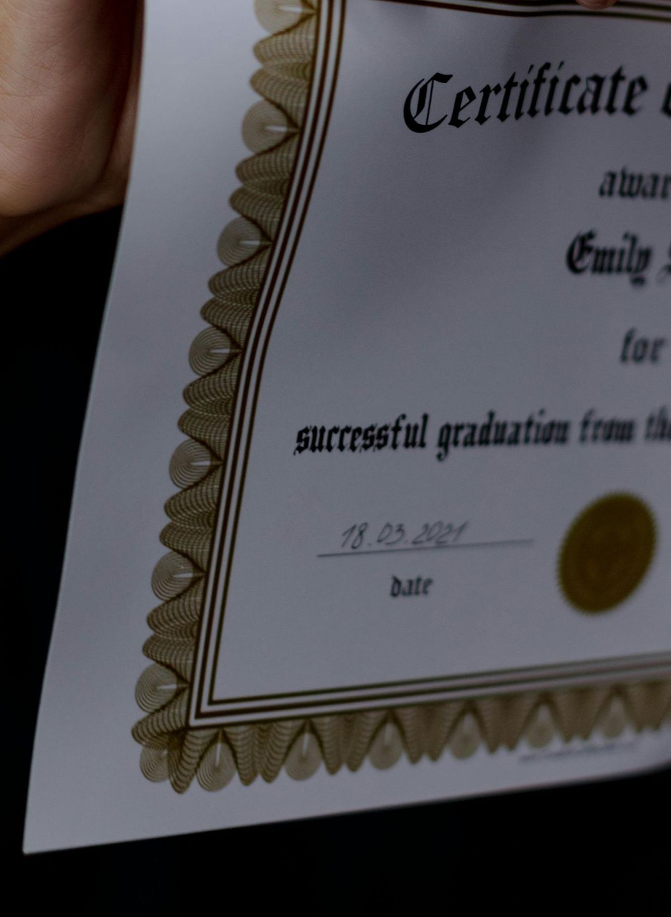 A close up of a certificate that says successful graduation