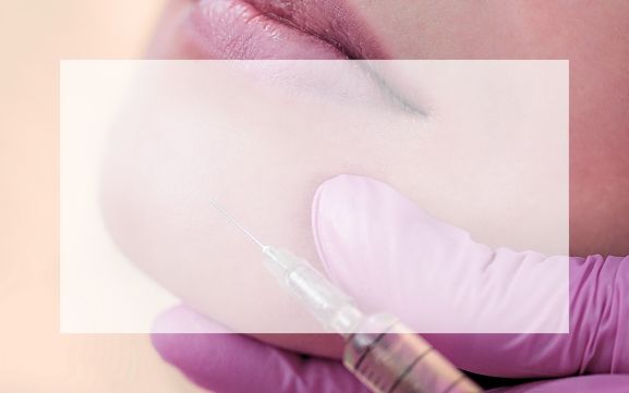PATIENT RECEIVING DERMAL FILLER TO HER CHIN