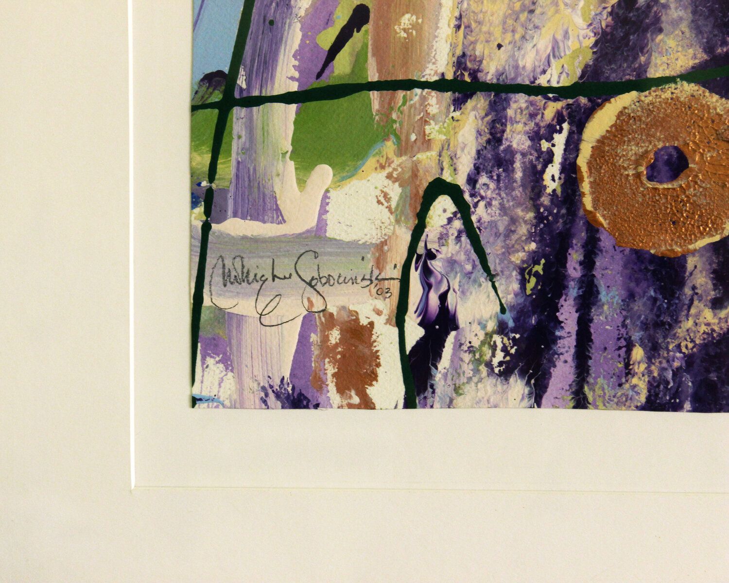 A close up of a painting with a signature on it