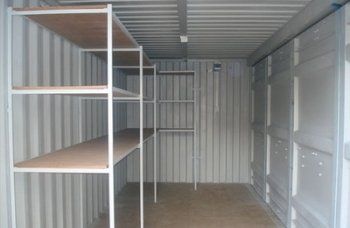 Shelving in a white shipping containers