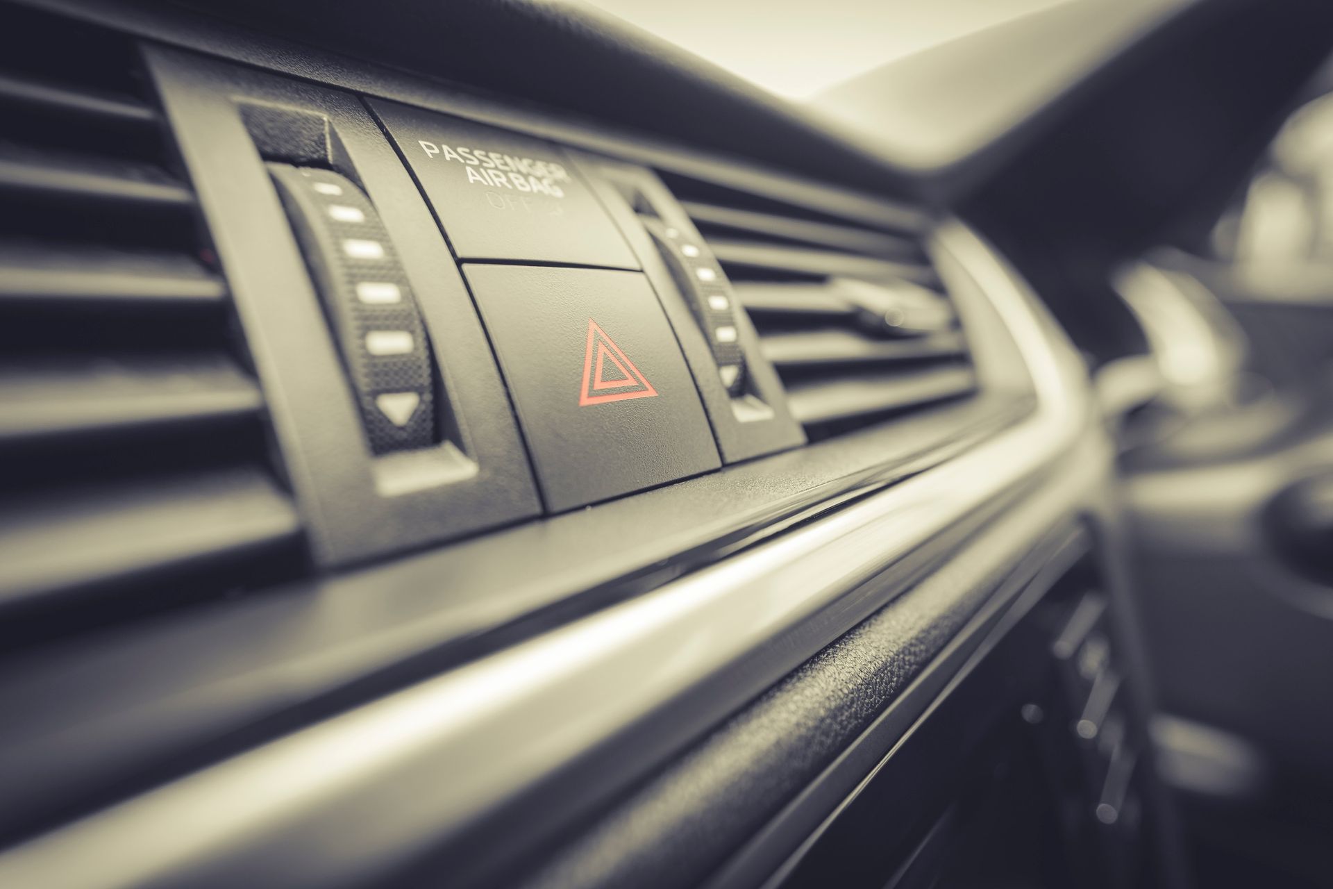 Car Dashboard Detail With Hazard Lights Button and Air Vents — Direct Current Solutions in Mareeba, QLD