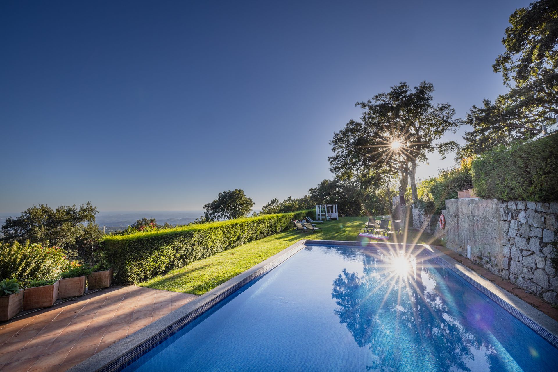 Swimming pool with a dash of sun