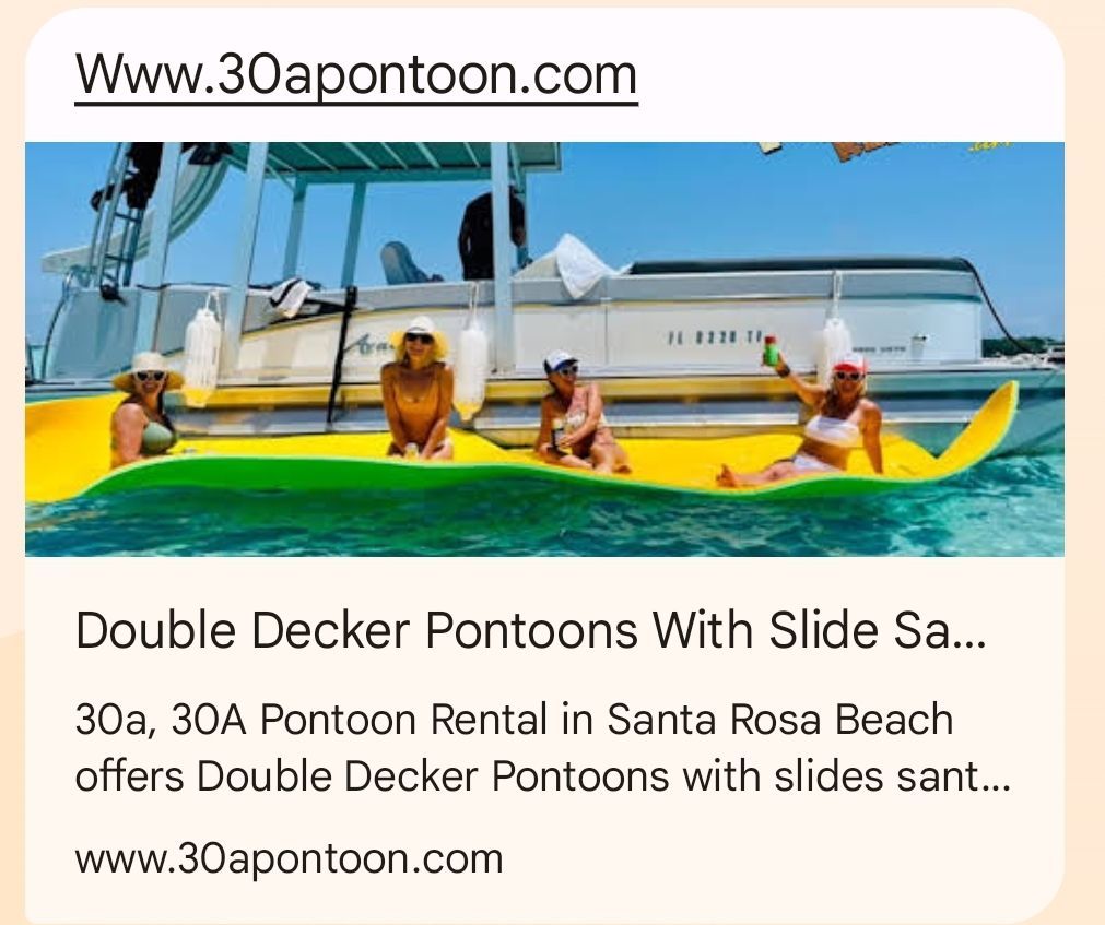 People on a pontoon boat with a yellow inflatable in Santa Rosa Beach.