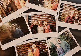 A collage of polaroid photographs featuring various groups of people in both indoor and outdoor settings.