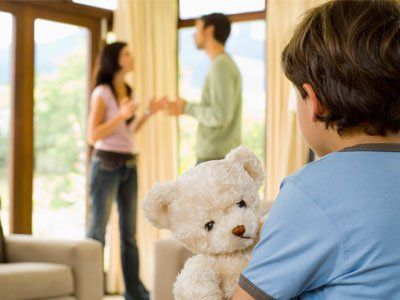 Boy with teddy bear and parents fighting - Custody in Fort Wayne, IN