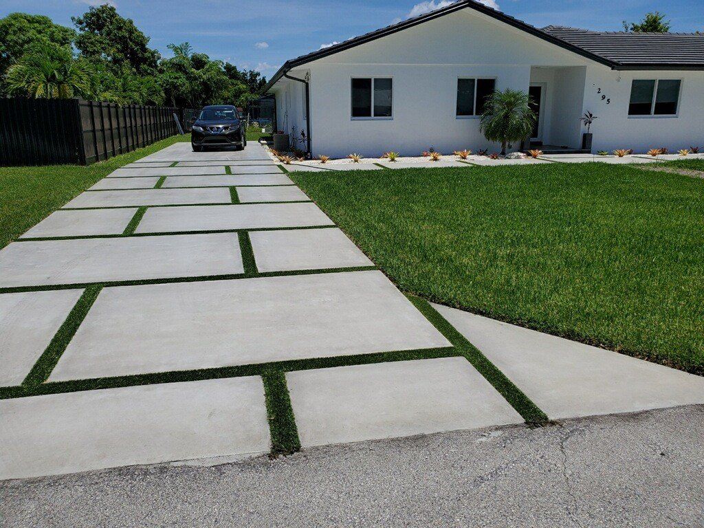 House Driveway with Car — Miami, FL — Concrete Services Pump and Finishing Inc.