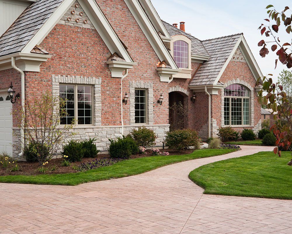 Home with Concrete Driveway — Miami, FL — Concrete Services Pump and Finishing Inc.