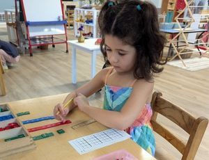 Young child, showing focus, persistence, and independence