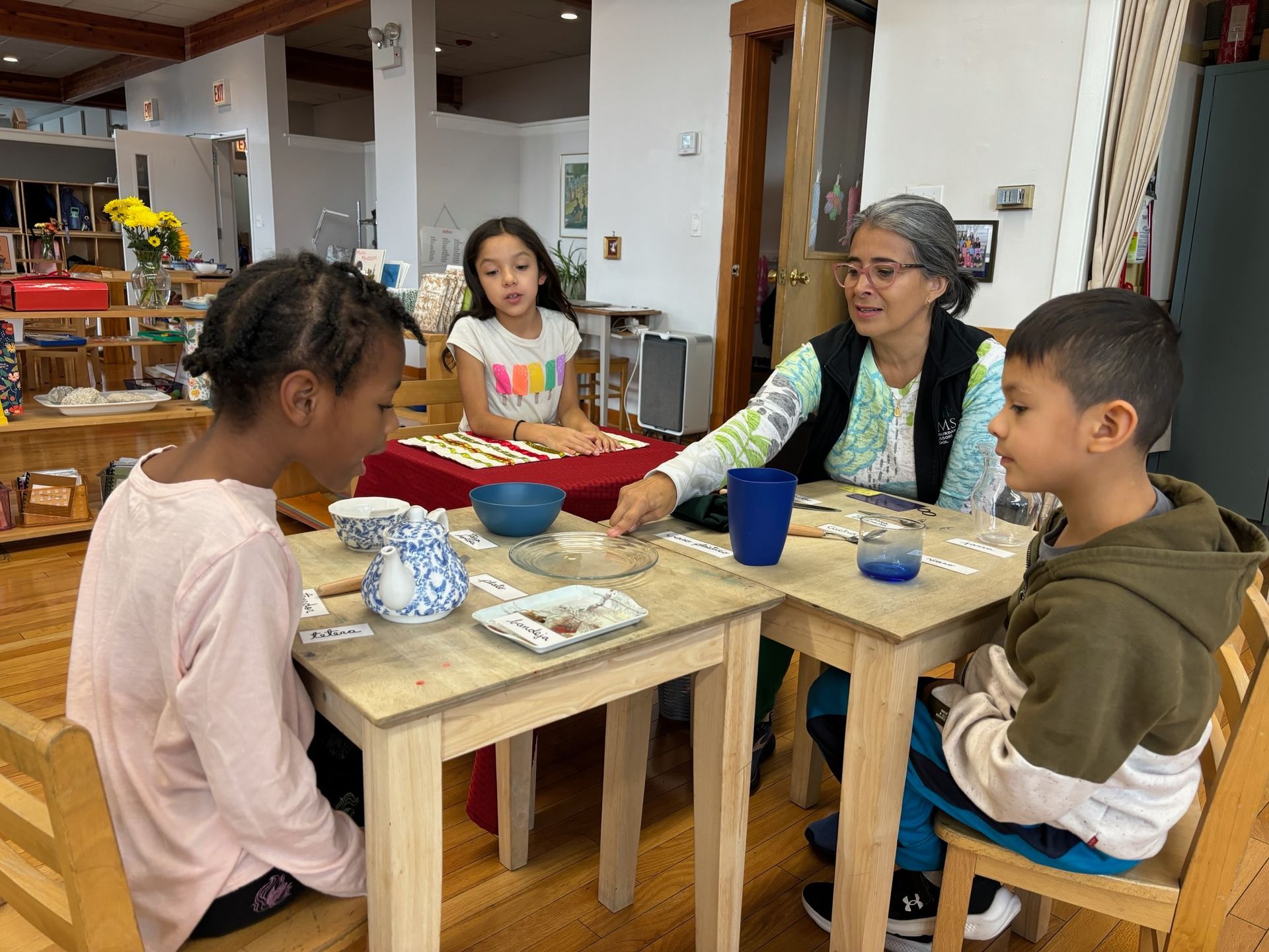 montessori children working with spanish activity