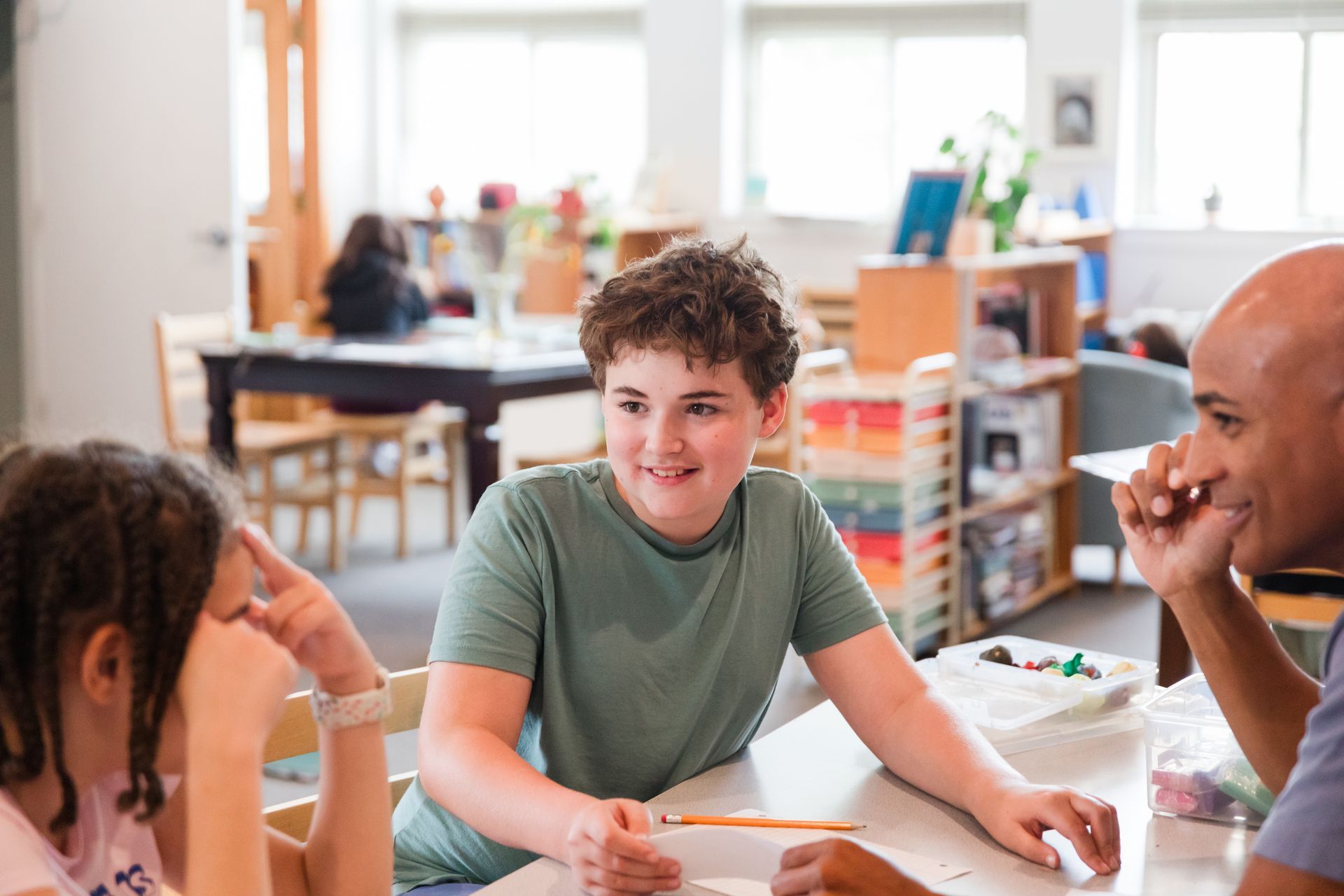 Montessori elementary student with their guide