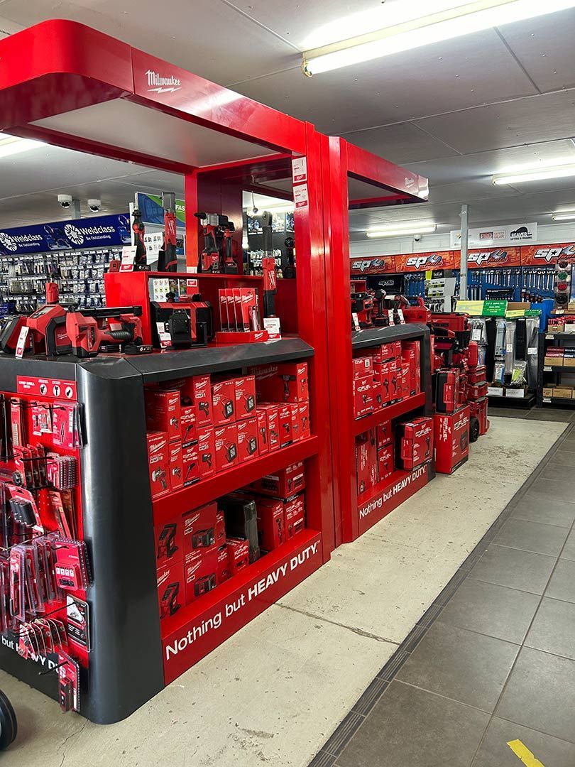 A Store Filled with Lots of Red Shelves and Boxes — Alice Hosetech & Industrial Supplies in Ciccone, NT