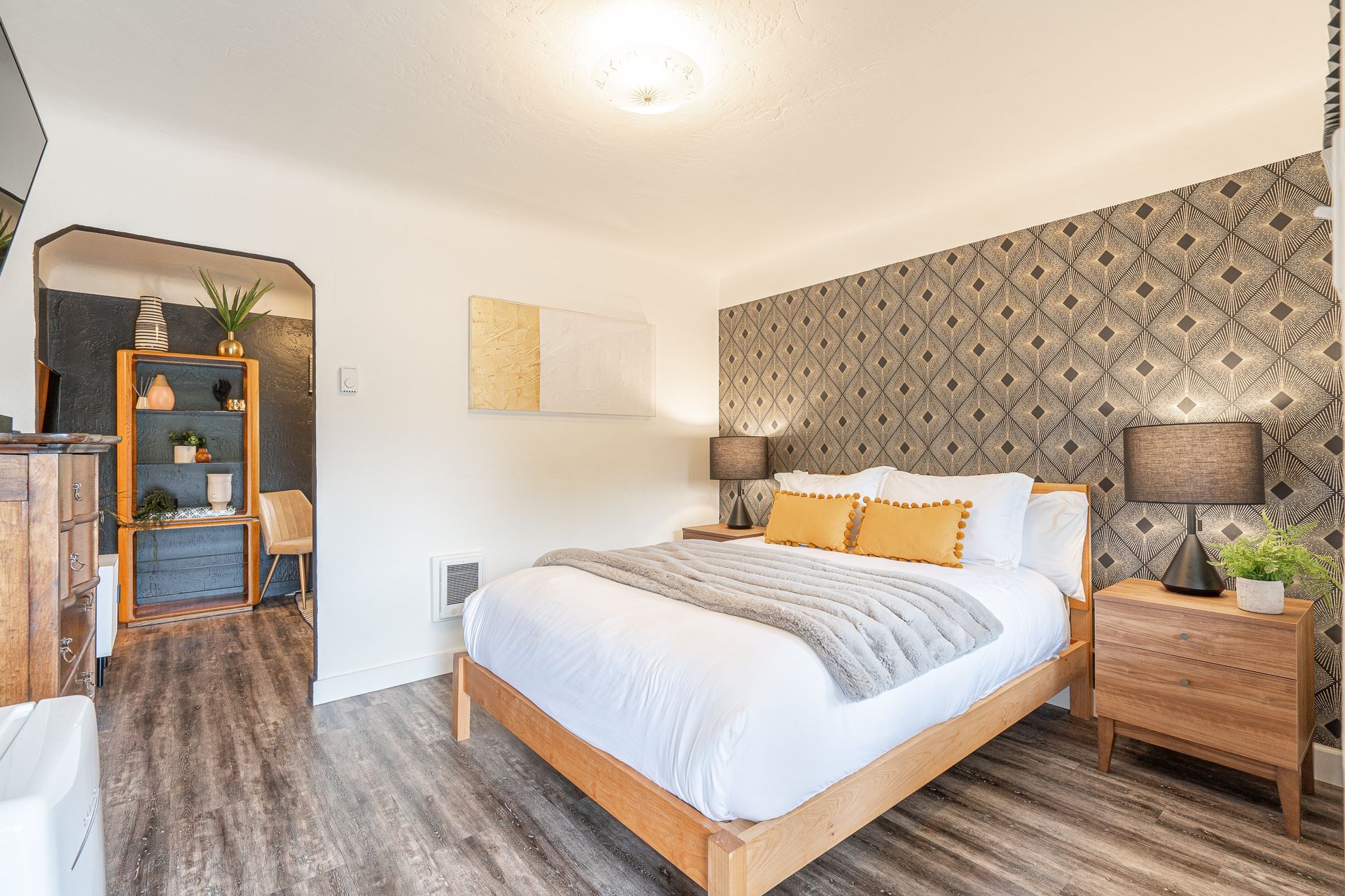 There is a large bed in the middle of the room.