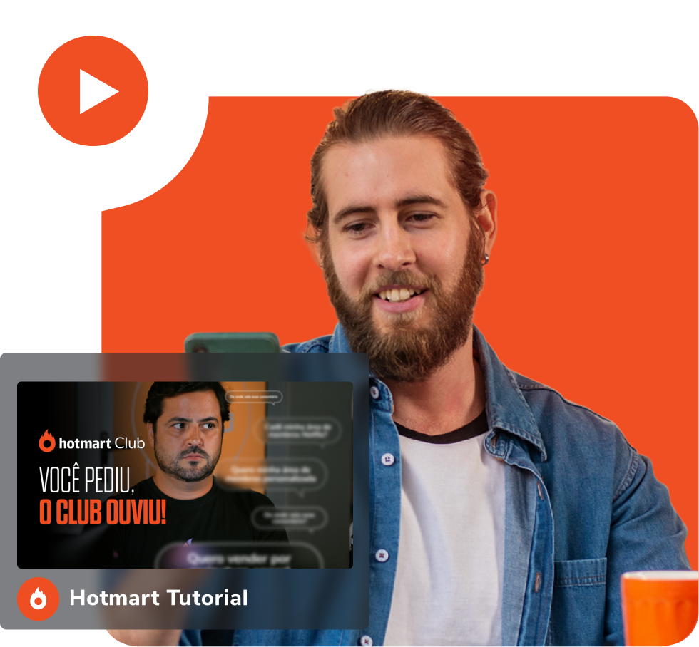 Um homem com barba está olhando para uma tela que diz tutorial do hotmart