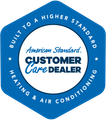 Blue hexagonal logo for an American Standard Customer Care Dealer in Heating & Air Conditioning.