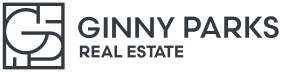 Ginny Parks Real Estate logo with monogram and text.