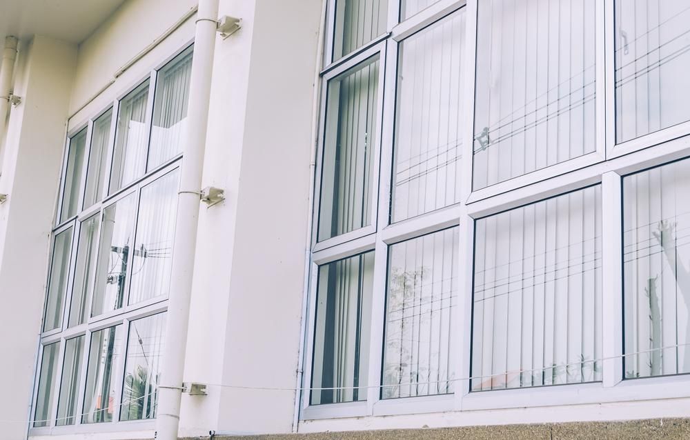 White Building With a Lot of Windows on It — Glass & Window Centre, Dubbo, NSW