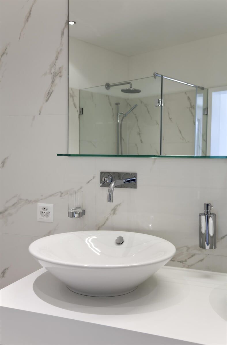 Bathroom With a Sink and a Mirror — Glass & Window Centre, Dubbo, NSW