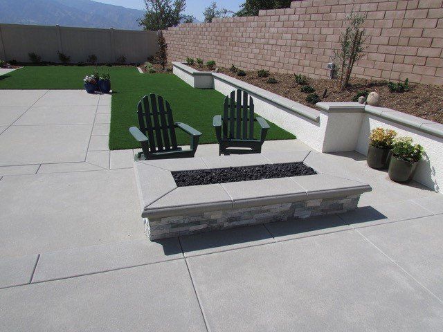 Concrete Fireplace With Two Chairs — Chino, CA — California Custom Landscape Inc.
