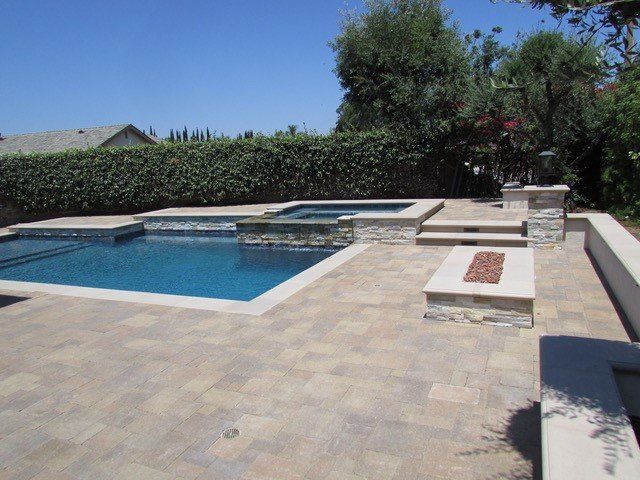 Swimming Pool Area With Concrete Flooring — Chino, CA — California Custom Landscape Inc.