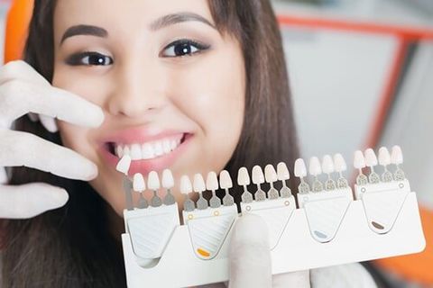 Beautiful asian woman smile with healthy teeth whitening - general dentistry in Gurnee, IL