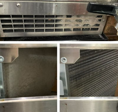 A close up of a stainless steel refrigerator with a black handle.