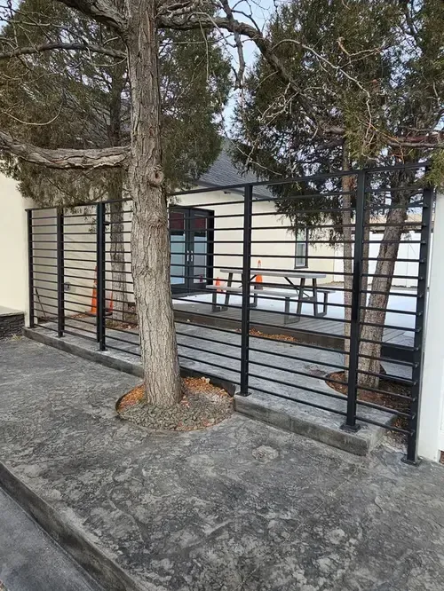 A custom metal Gate and security Fence fabricated and installed by 83MetalCraft, LLC in Star, Idaho