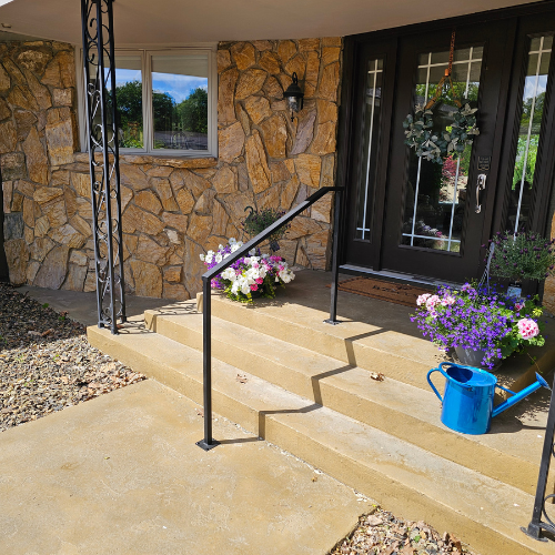a black grabrail fabricated and installed by 83MetalCraft ,LLC in Caldwell Idaho