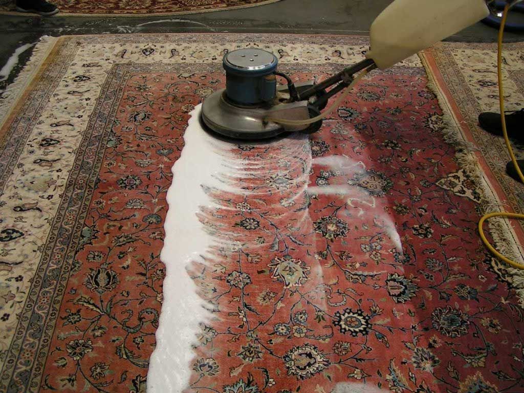 A Rug Being Cleaned with A Machine — Totally Green Cleaning Solutions in Kambah, ACT