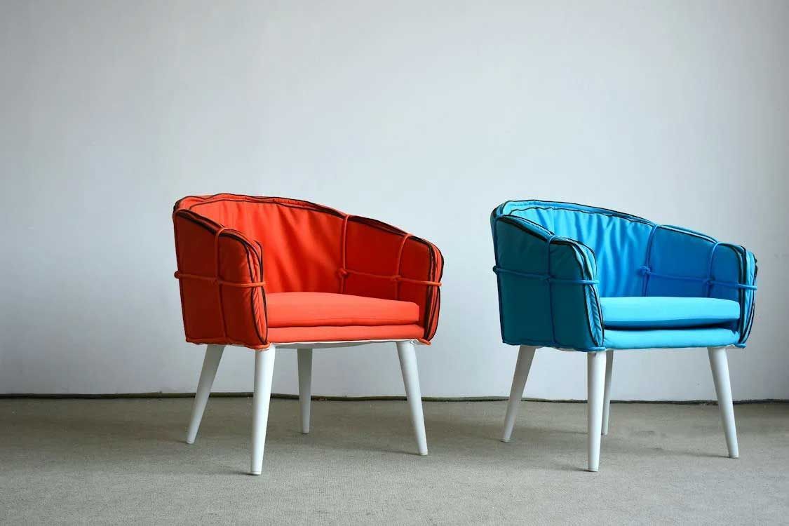 Orange and Blue Armchairs and White Wall — Totally Green Cleaning Solutions in Kambah, ACT