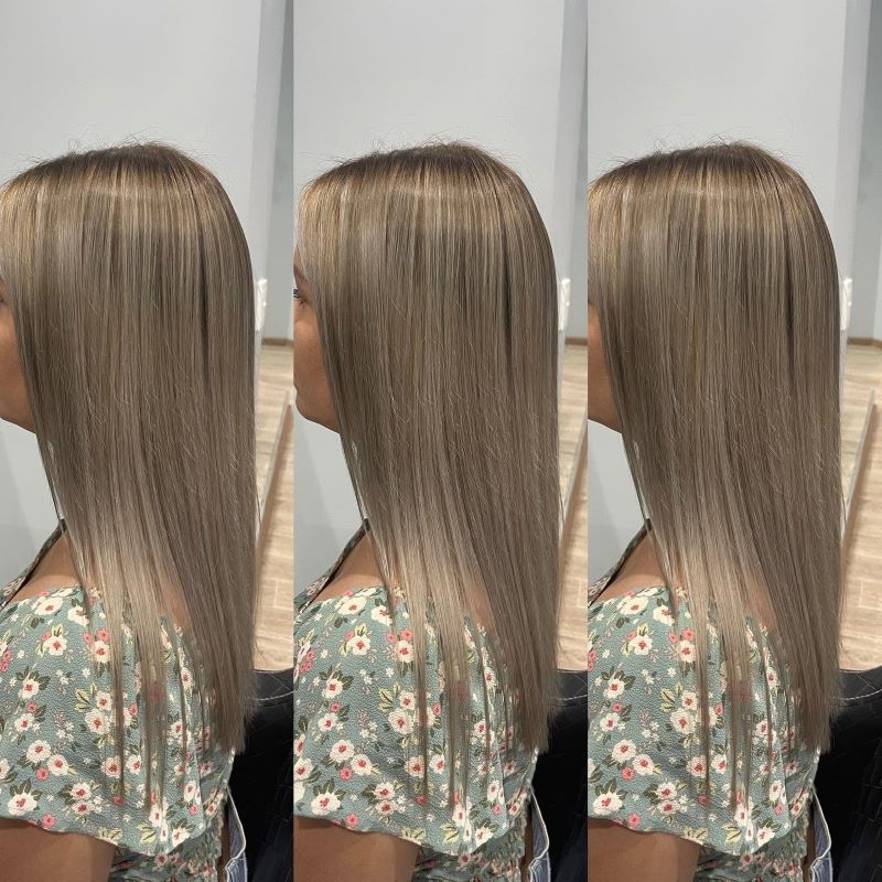 A Woman with Long Blonde Hair — Fraser Shores Hair Design in Urraween, QLD