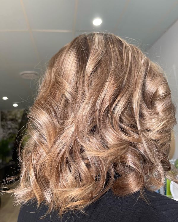 A Close up Of a Woman Hair in A Salon — Fraser Shores Hair Design in Urraween, QLD
