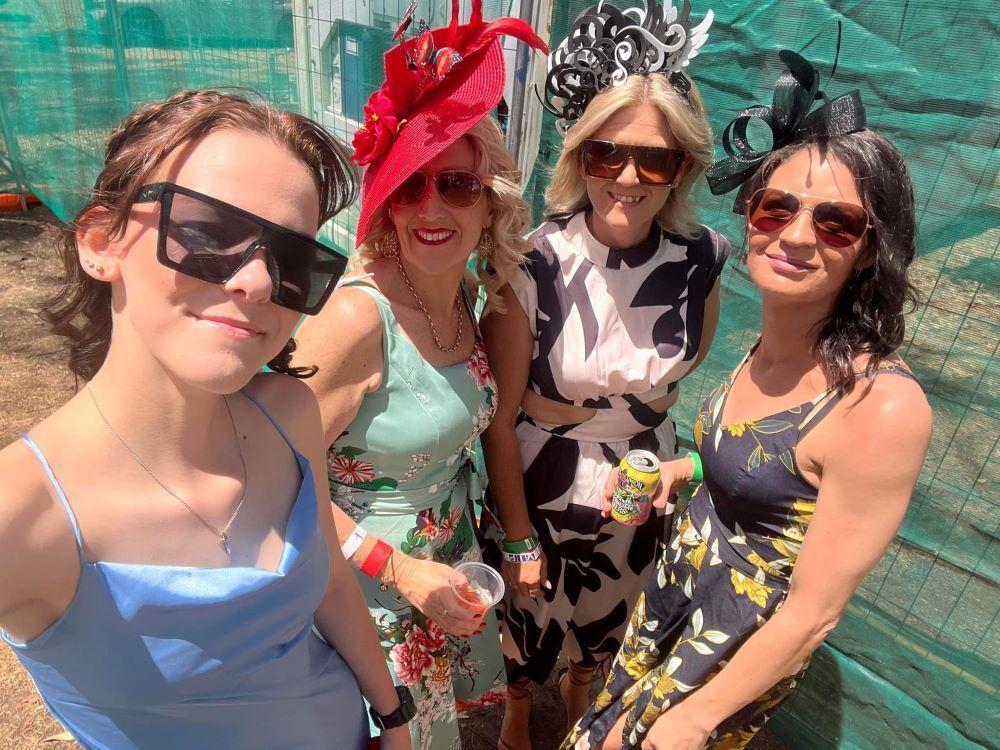 A Group of Women Wearing Sunglasses and Hats — Fraser Shores Hair Design in Urraween, QLD