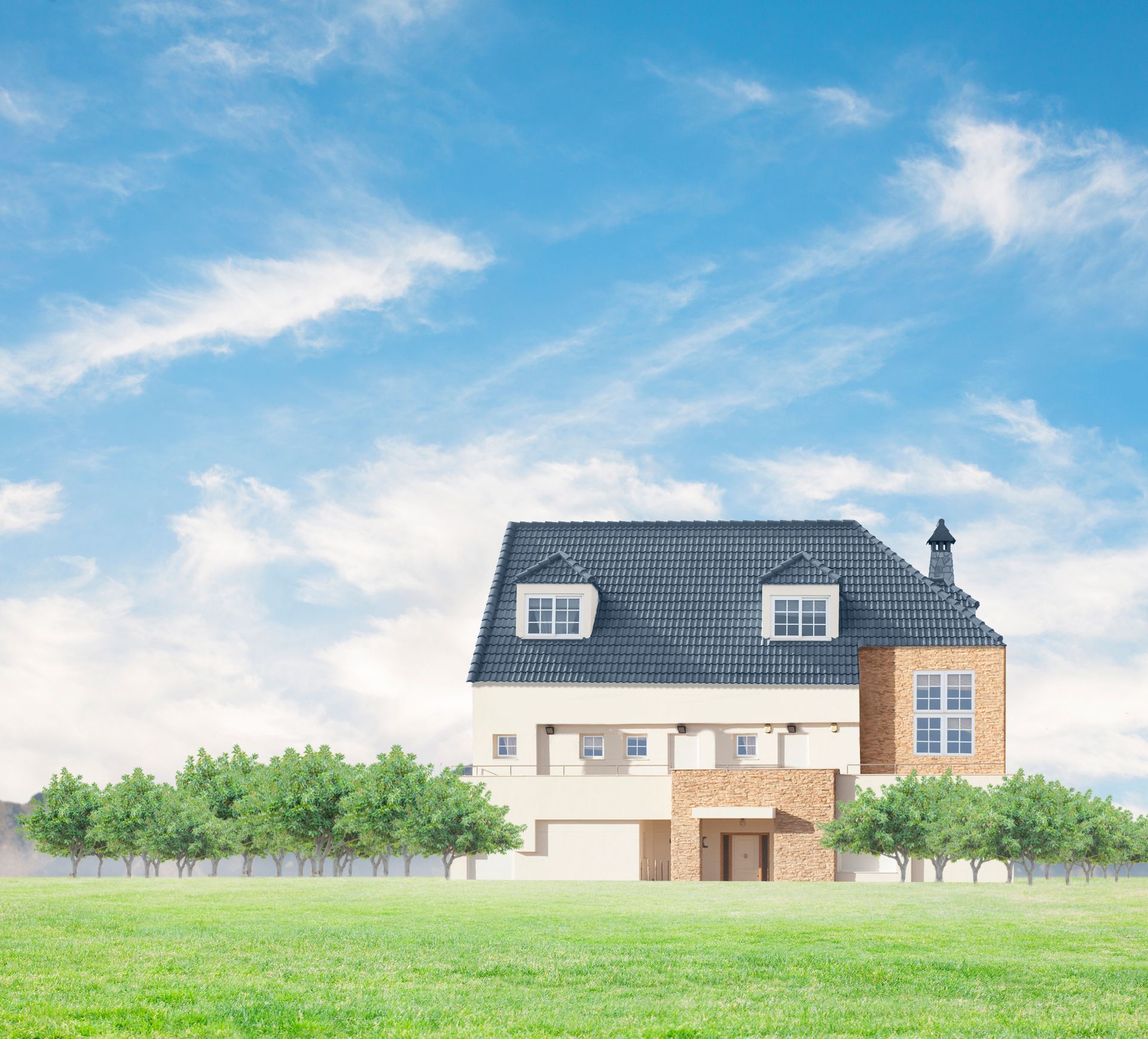 Two-story house with blue roof, beige walls, and brick accents, in a field under a blue sky with clouds.