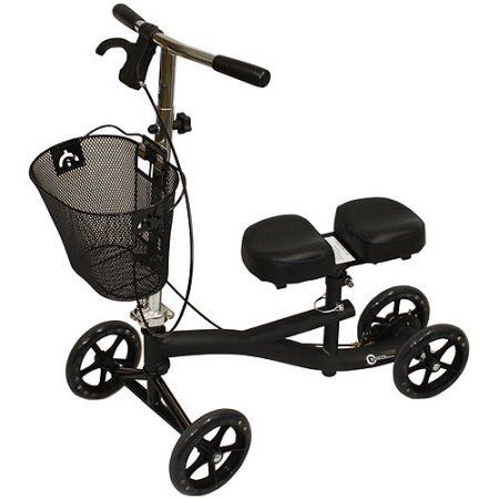 A black knee scooter with a basket attached to it.