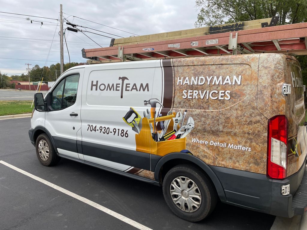 A white and camouflage-patterned van with